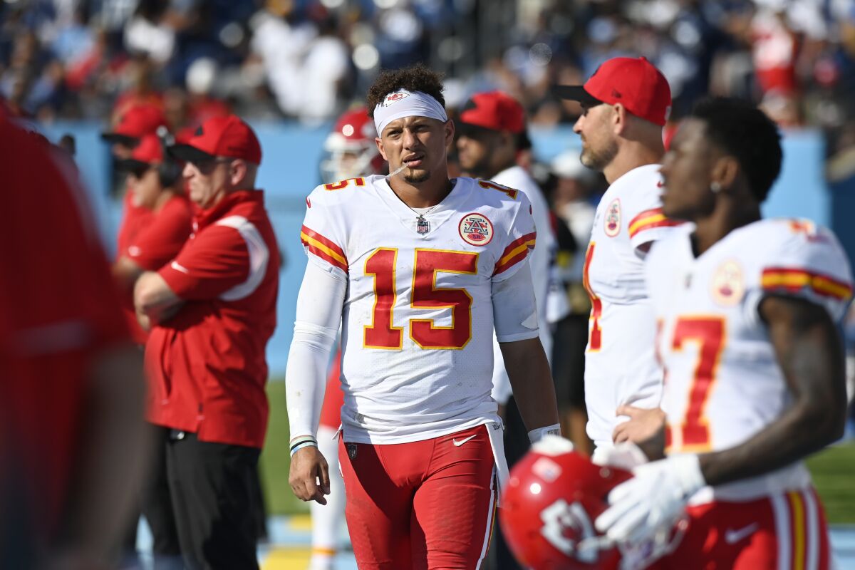 Chiefs quarterback Patrick Mahomes walks on the sideline after leaving the medical tent.
