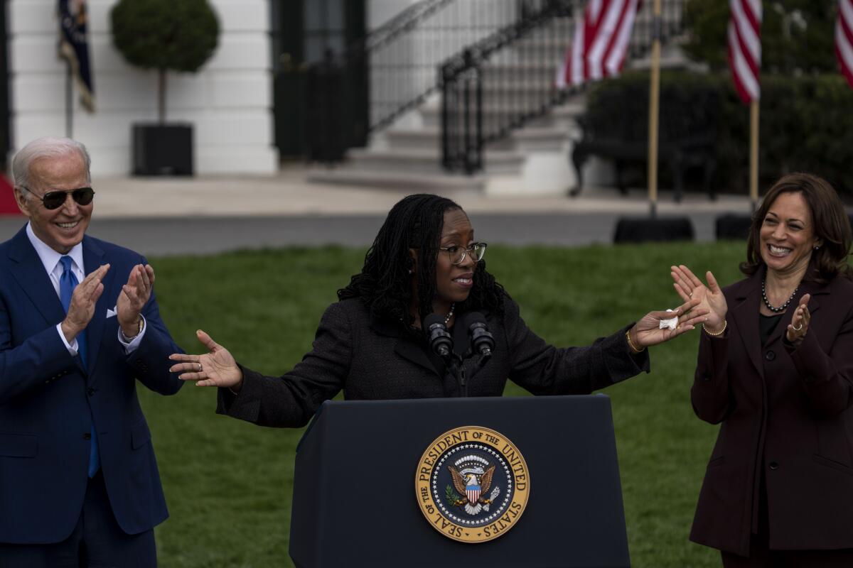 Judge Ketanji Brown Jackson, with President Biden and Vice President Kamala Harris outside the White House. 