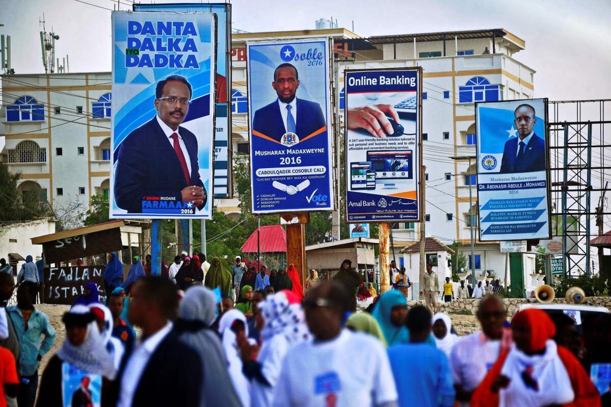 Campaign posters in Mogadishu tout candidates for president of Somalia.