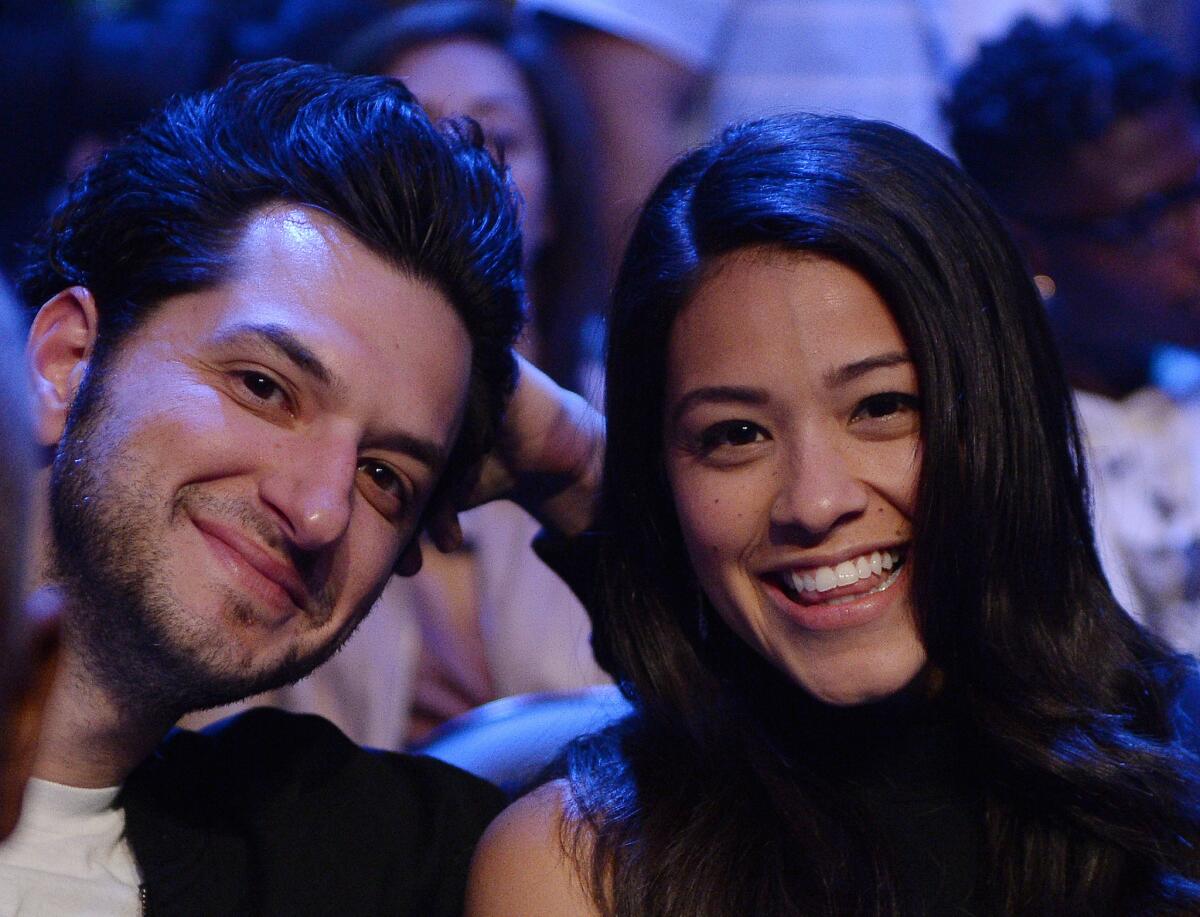 Actors Ben Schwartz and Gina Rodriguez attend the Danny Garcia and Robert Guerrero WBC championship welterweight bout at Staples Center on Jan. 23, 2016, in Los Angeles.