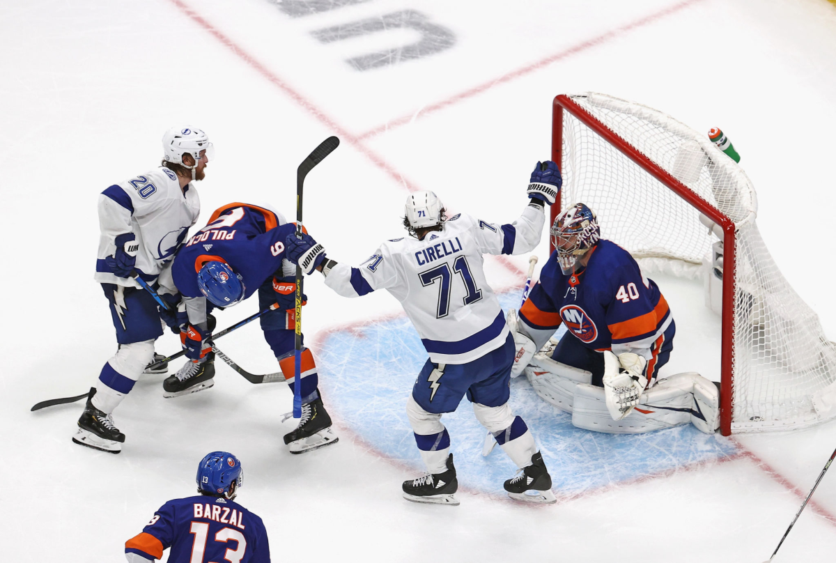 Lightning forward Anthony Cirelli celebrates his series-winning goal on Islanders goalie Semyon Varlamov.
