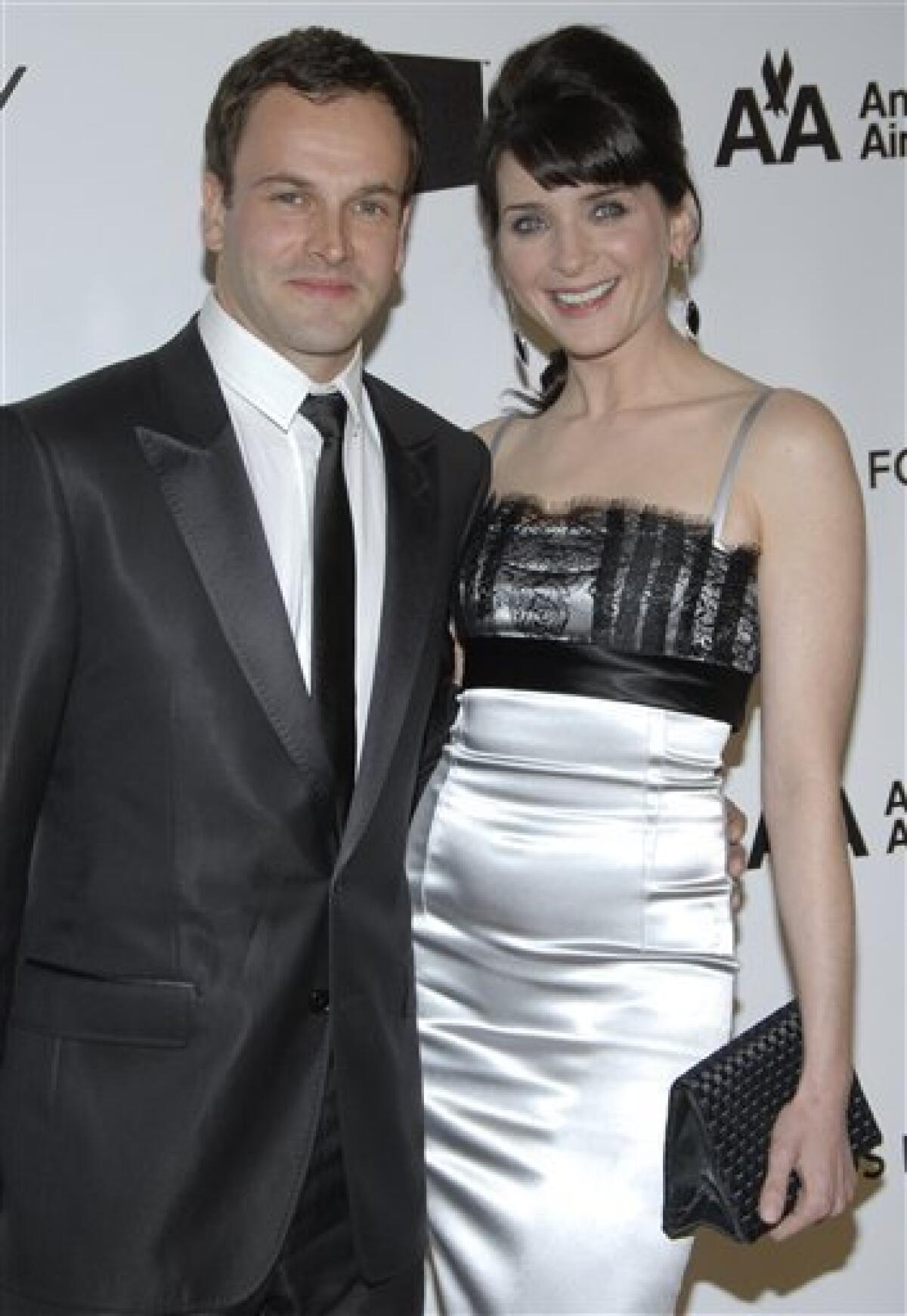 Actor Johnny Lee Miller and Michele Hicks poses on the press line at the Elton John Oscar Party in West Hollywood, Calif. on Sunday, Feb. 24, 2008. Miller has given birth to a baby boy. A publicist for Miller says actress and model Michele Hicks gave birth Wednesday to Buster Timothy Miller in Los Angeles. Publicist Ina Treciokas says the baby boy weighed 9 pounds and is the couple's first child. (AP Photo/Dan Steinberg)