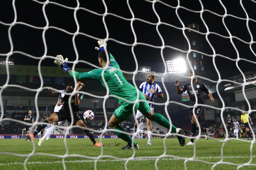 DOHA, QATAR - DECEMBER 14: Dorian Pabon of C.F. Monterrey shoots and misses as Saad Al Sheeb of Al-Sadd Sports Club dives to save during the FIFA Club World Cup 2nd round match between Monterrey and Al-Sadd Sports Club at Jassim Bin Hamad Stadium on December 14, 2019 in Doha, Qatar. (Photo by Francois Nel/Getty Images) ** OUTS - ELSENT, FPG, CM - OUTS * NM, PH, VA if sourced by CT, LA or MoD **