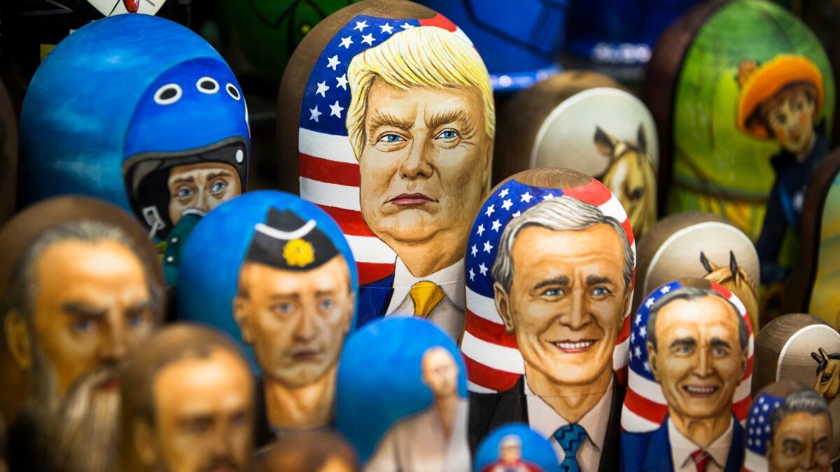 Matryoshkas, traditional Russian wooden nesting dolls, including a doll of President Trump, are displayed for sale in Moscow on March 2.