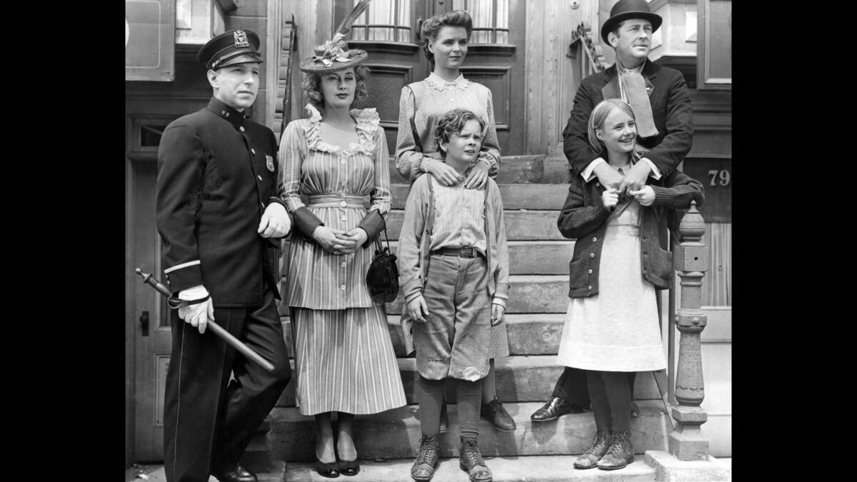 From left, Lloyd Nolan, Joan Blondell, Dorothy McGuire, Ted Donaldson, James Dunn and Peggy Ann Garner in the 1945 movie "A Tree Grows in Brooklyn."