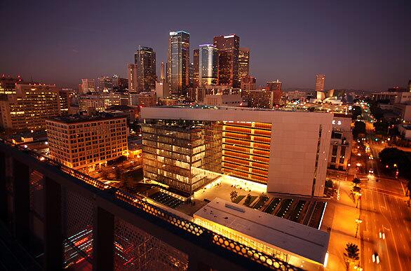 Most of the new Los Angeles Police Department headquarters is set back from the sidewalk for security purposes; the resulting spaces are pedestrian-friendly.