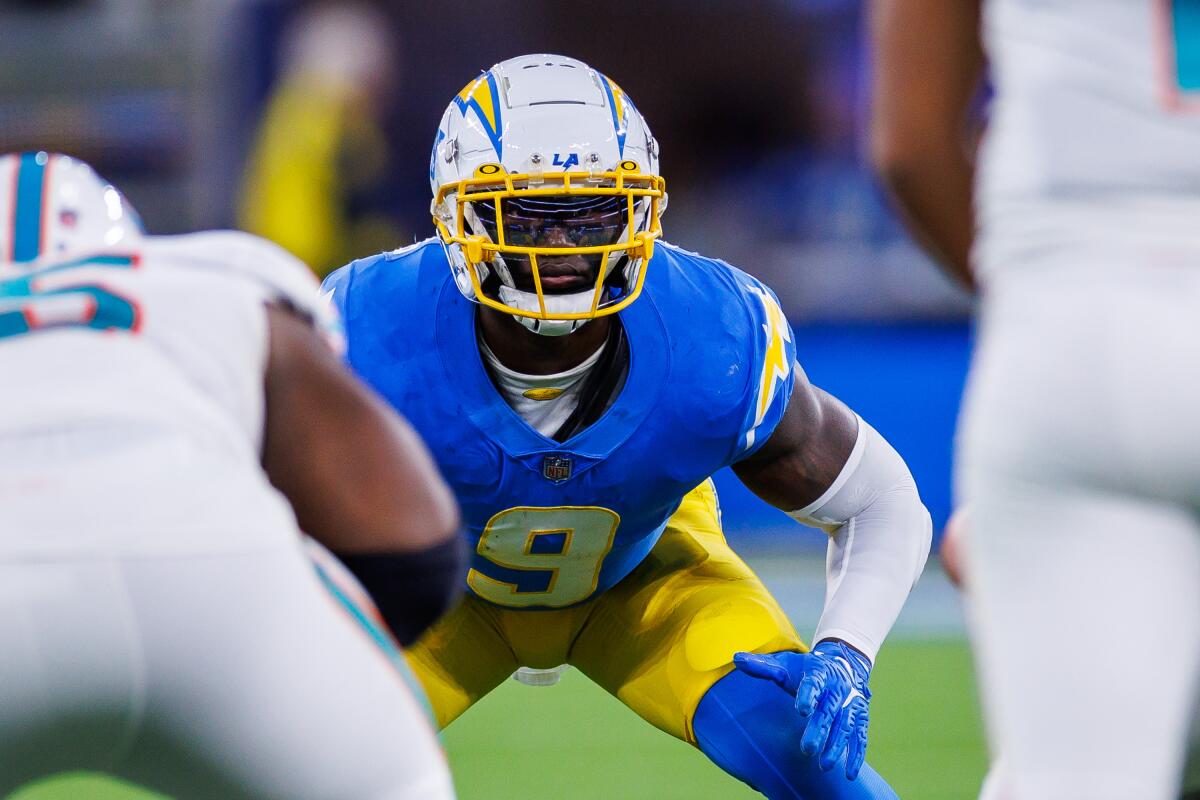 Chargers linebacker Kenneth Murray Jr. lines up against the Dolphins.