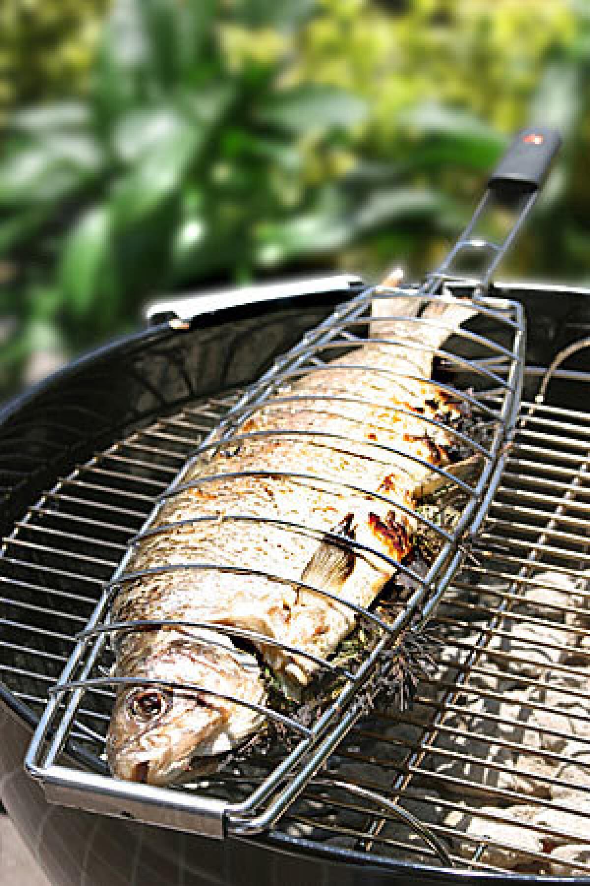 Grilled fish  light, flavorful and quickly cooked  is the perfect entree for alfresco meals. The right fish and the right fire are key.