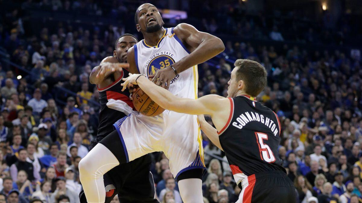 Golden State Warriors' Kevin Durant (35) is fouled against the Portland Trail Blazers during the second half on Jan. 4.