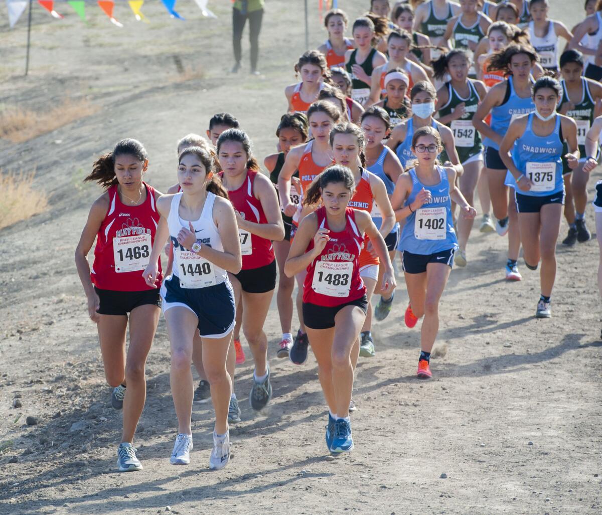 Flintridge Prep's Nicole Mirzaian (#1440) is at the front of the pack at the start of the girls varsity Prep League Cross Country finals at Pierce College Saturday. (Photo by Miguel Vasconcellos)