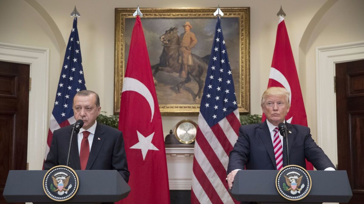Turkish President Recep Tayyip Erdogan and President Trump deliver statements in the Roosevelt Room of the White House on Tuesday.