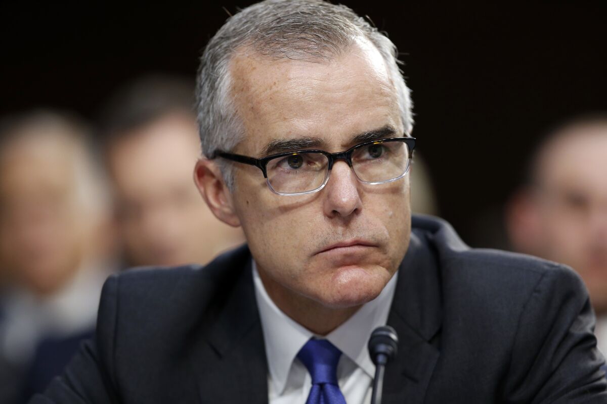 Former FBI acting director Andrew McCabe listens during a hearing on Capitol Hill in Washington, D.C.
