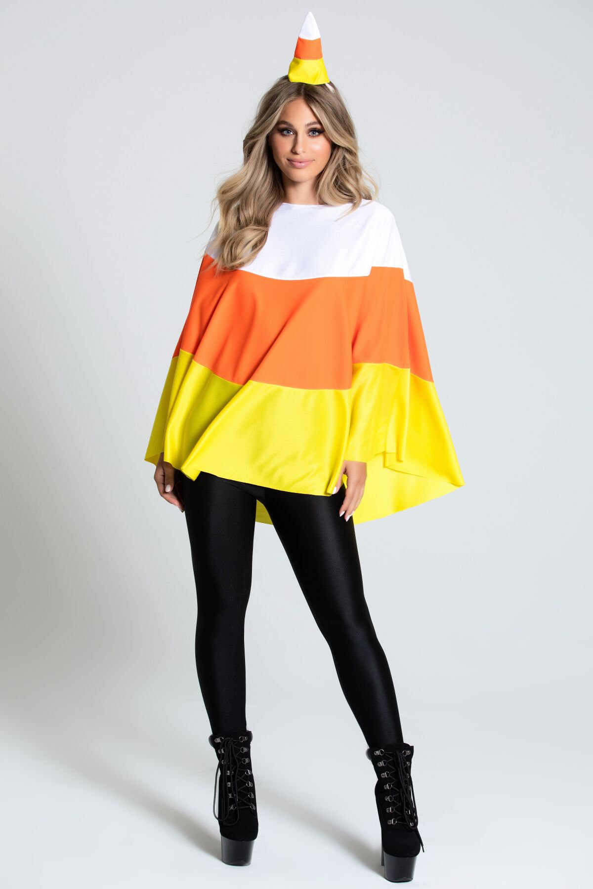 A model wears a candy corn costume.