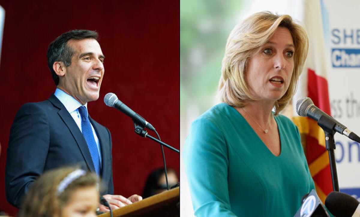 Los Angeles mayoral candidates Eric Garcetti and Wendy Greuel.