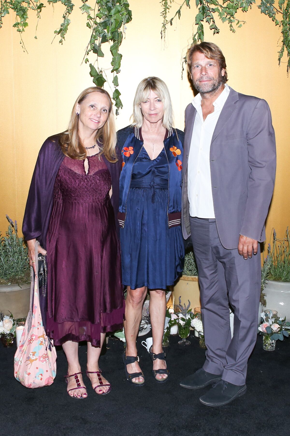 Artists Marnie Weber, left, and Kim Gordon with writer Jamie Brisick. (Sansho Scott / BFA.com)