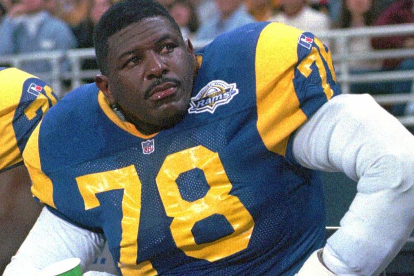 FILE--St. Louis Rams' Jackie Slater (78) takes a break during the game against the Carolina Panthers in St. Louis, in this Nov. 12, 1995 file photo. Slater was elected to the Pro Football Hall of Fame, Sunday, January 27, 2001. (AP Photo/James A. Finley, File) ORG XMIT: NY156