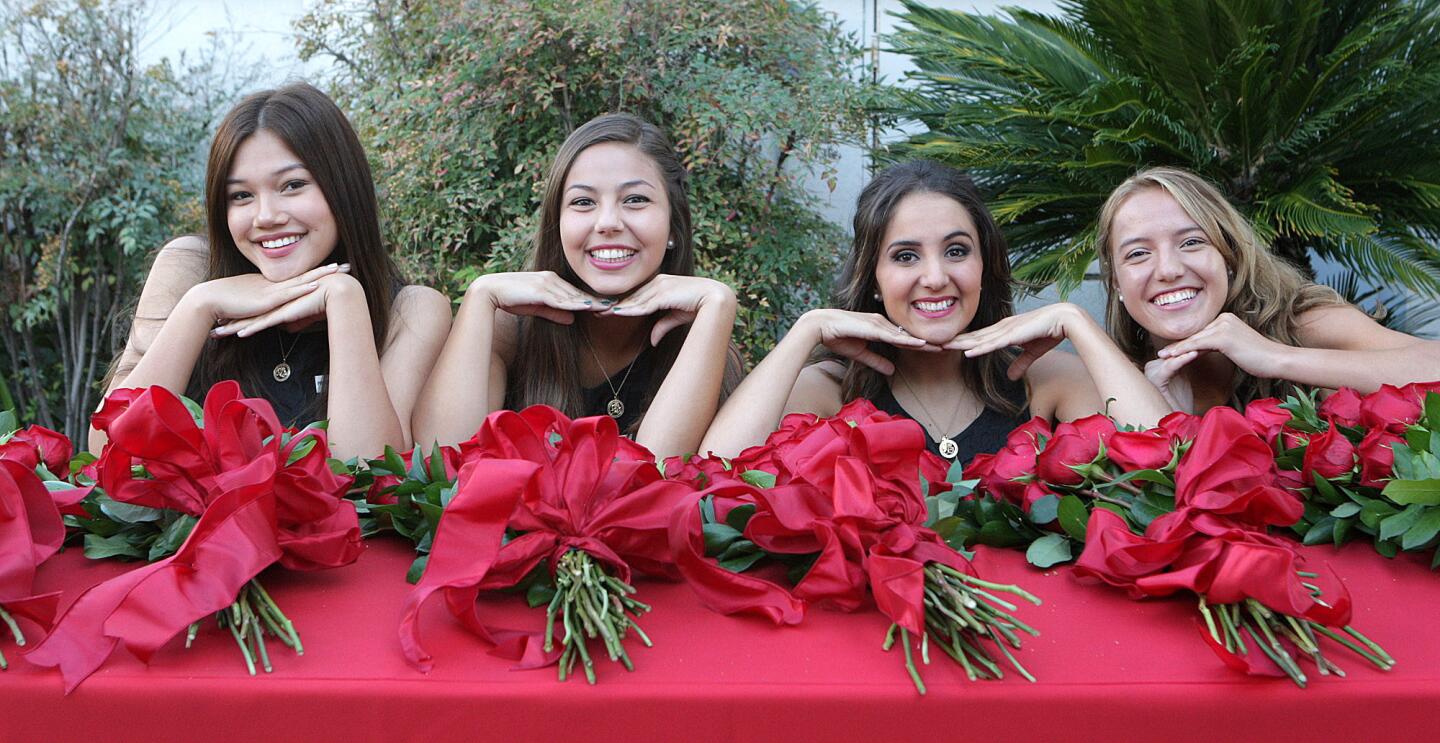 Gabrielle Current, Emily Stoker, Mackenzie Byers, and Veroncia Mejia, from the 2015 Royal Court, posing with bouquets of roses at the announcement of the 2016 Tournament of Roses Royal Court at the Tournament House in Pasadena on Monday, Oct. 5, 2015.