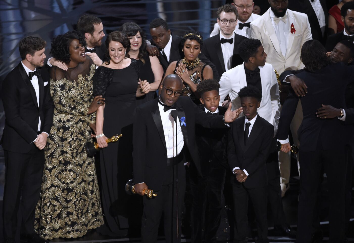 Barry Jenkins, center, and the cast and crew of "Moonlight," which won the Oscar for best picture.