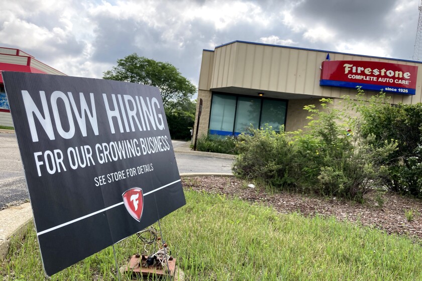 Hiring sign outside a store in Illinois