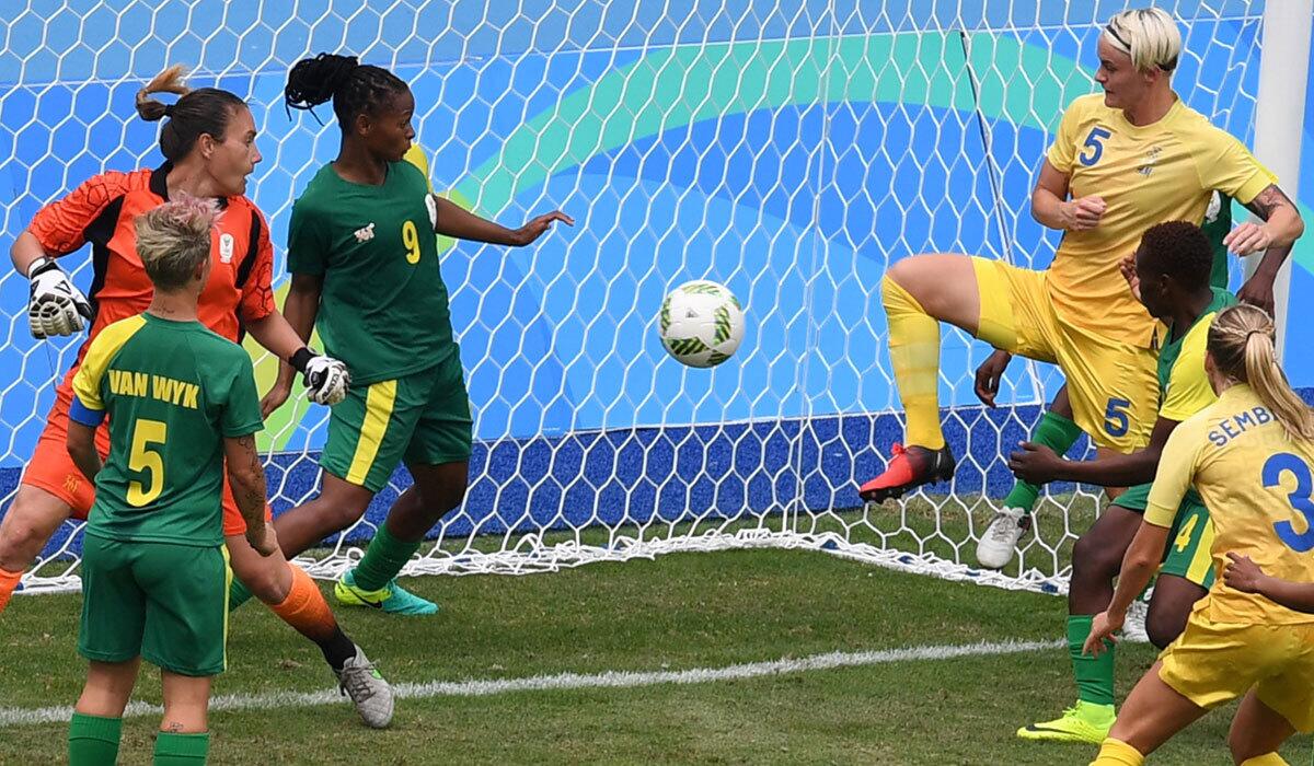 Sweden's Nilla Fischer scores a goal against South Africa.