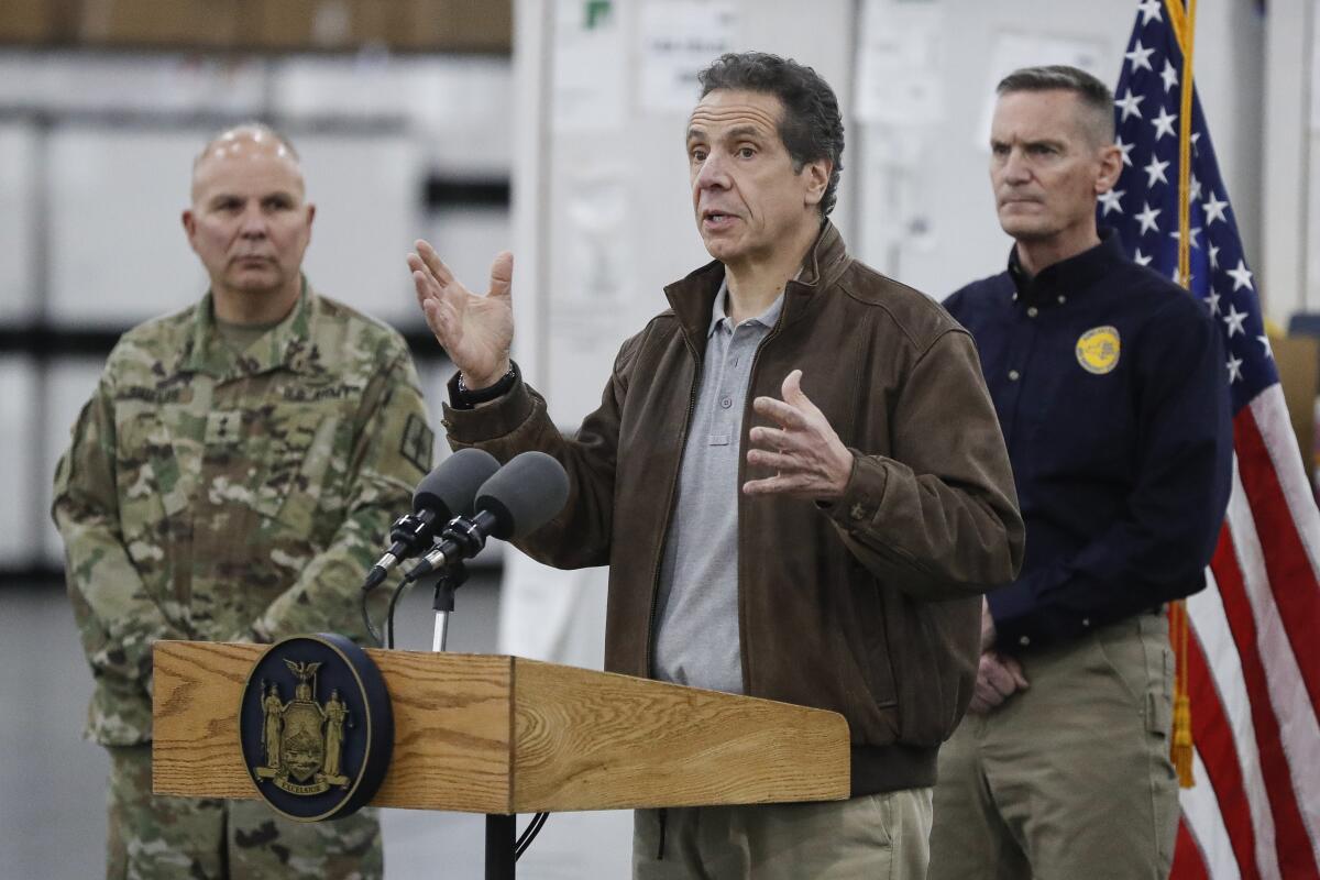 New York Gov. Andrew Cuomo speaks during a news conference alongside the National Guard at the Jacob Javits Center, which will house a temporary hospital in response to the COVID-19 outbreak.