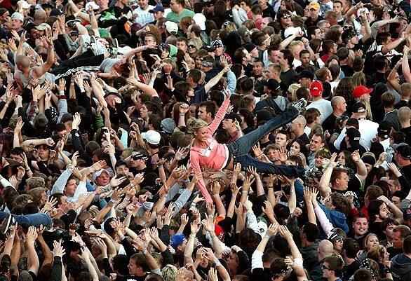 Fans crowd-surf at the Rock on the Range music festival in Columbus, Ohio.