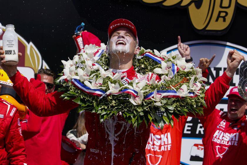 Marcus Ericsson, of Sweden, celebrates after winning the Indianapolis 500.