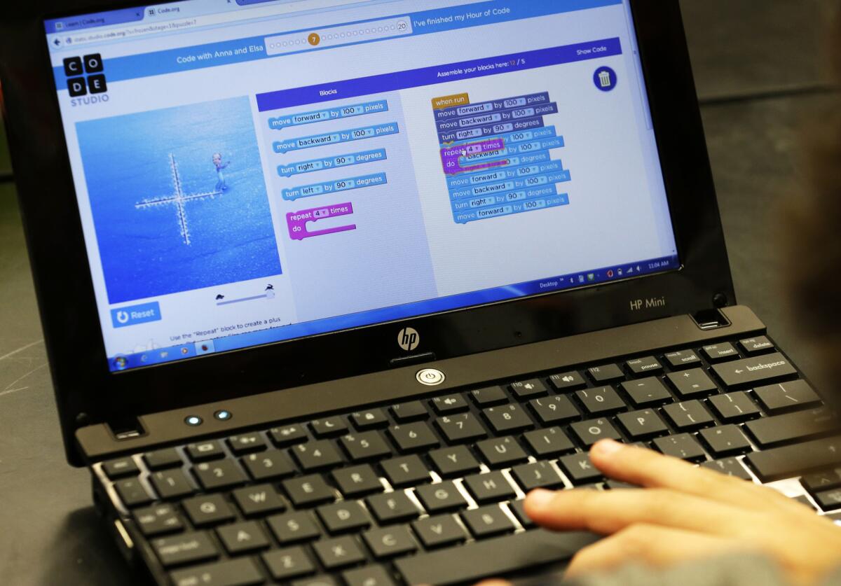 A student in Des Moines, Wash., writes computer code as part of a project in December. The Obama administration is pushing for more privacy standards for students doing schoolwork online.