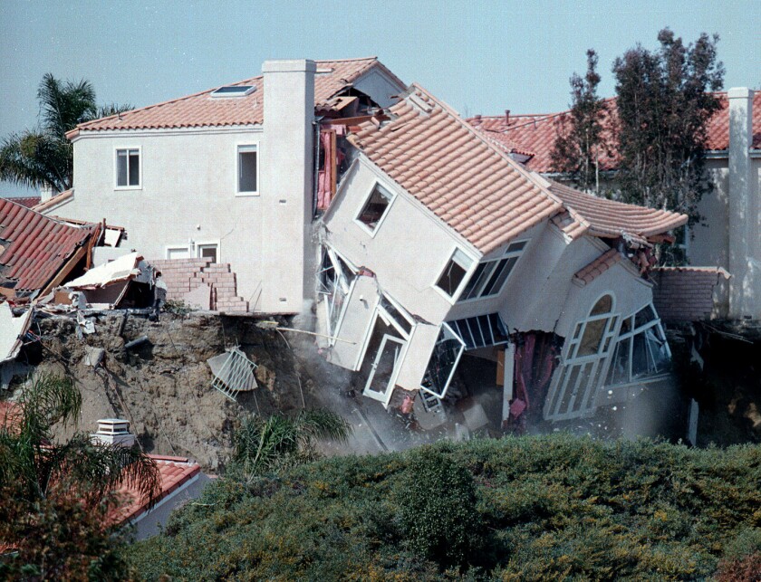 1998 image of a home that slid down a hill in Laguna Niguel