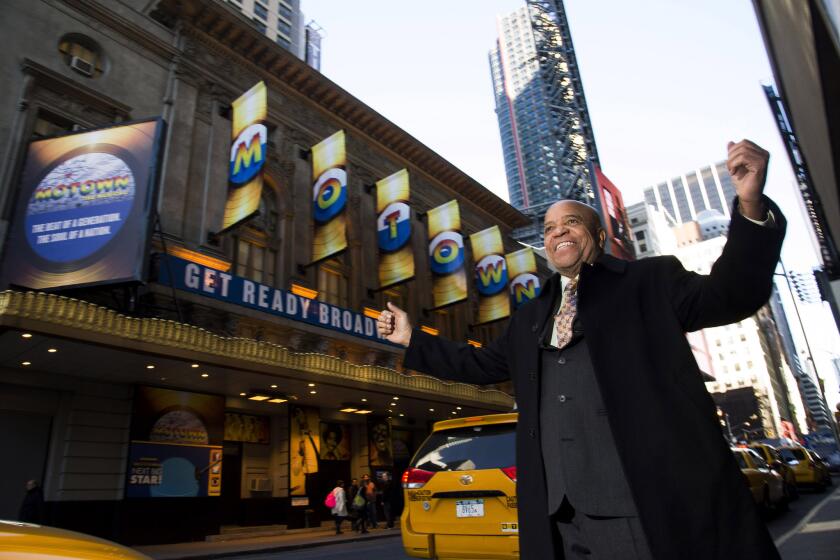 Berry Gordy poses for a portrait in March 2013 in front of the Lunt-Fontanne Theatre in New York City where "Motown -- The Musical" opened.