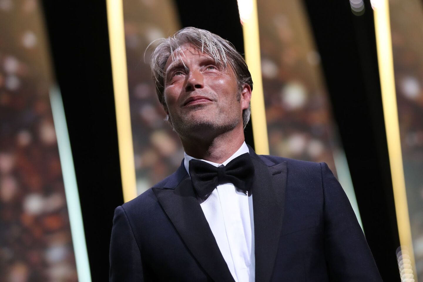 Actor and festival juror Mads Mikkelsen appears on stage during the opening ceremony of the Cannes Film Festival on Wednesday.