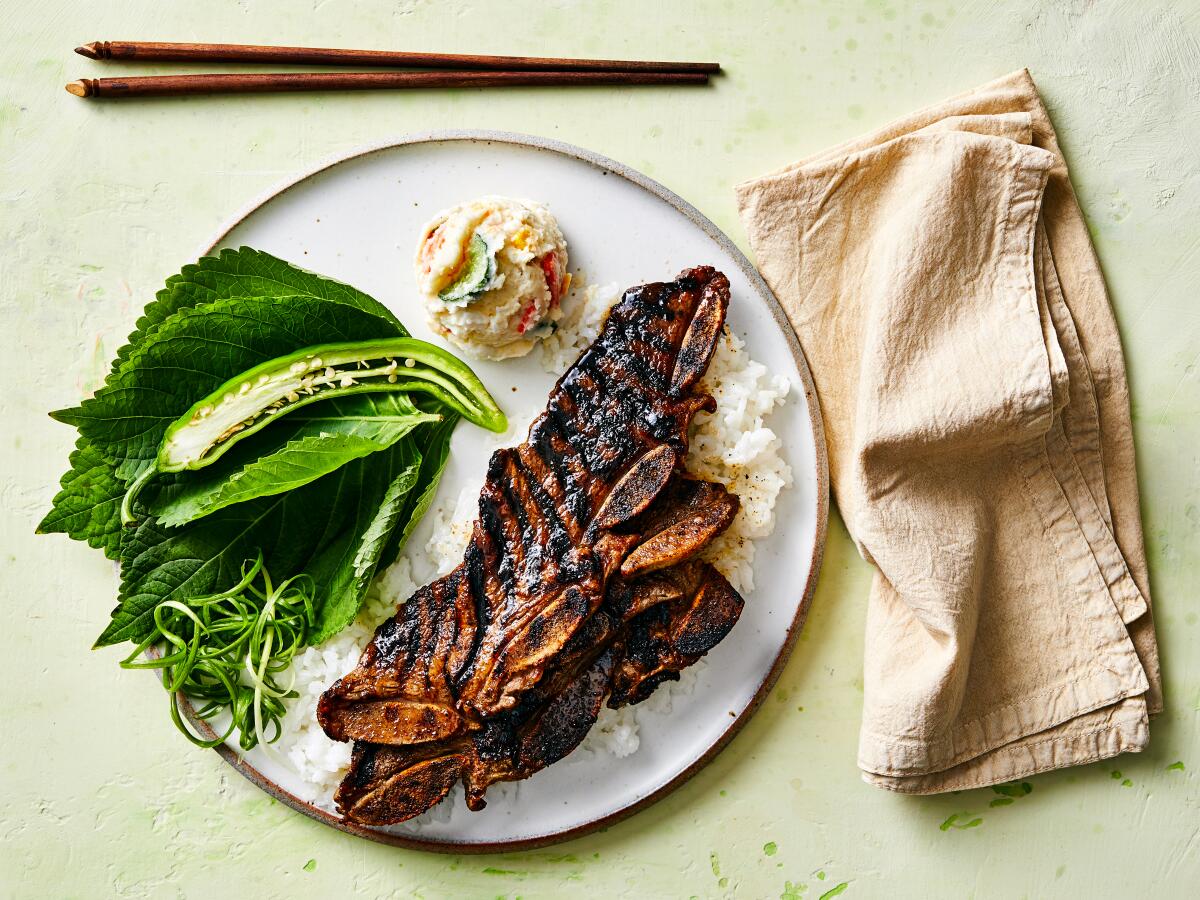 Grilled beef, perilla leaves, steamed rice, scallions and chile.