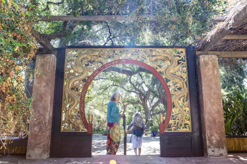 Ojai, CA - July 20: Diana Washburn (left) and Stephanie Moret (right) explore theTaft Gardens & Nature Preserve on Tuesday, July 20, 2021, in Ojai, CA. (Madeleine Hordinski / Los Angeles Times)