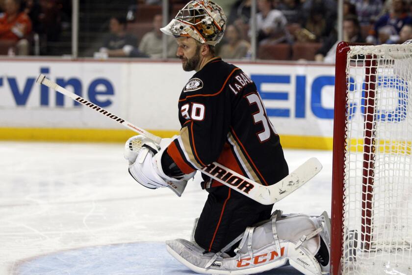 Goalie Jason LaBarbera looks on during the Ducks' 3-2 loss to the Islanders on Nov. 5. LaBarera was activated Thursday after missing five games with a hand injury.