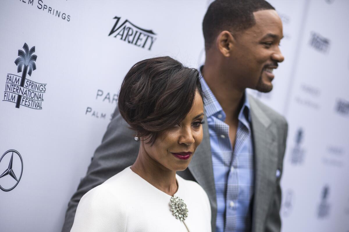 Actors Jada Pinkett Smith, left and Will Smith before the start of the Variety magazine luncheon, at the 2016 Palm Springs International Film Festival on Jan. 03, 2016.