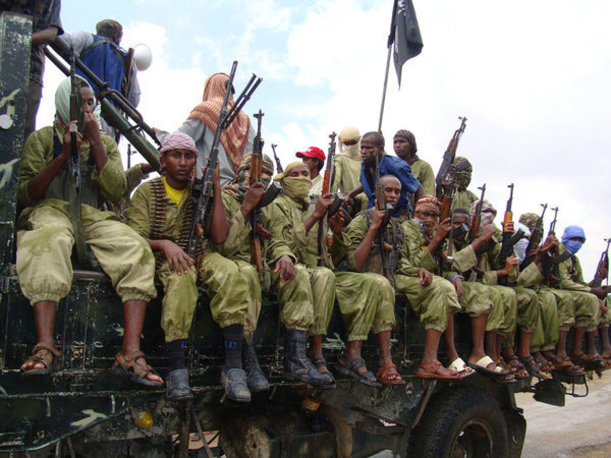 A truckload of Shabab fighters patrols Mogadishu, Somalia, in October 2009.