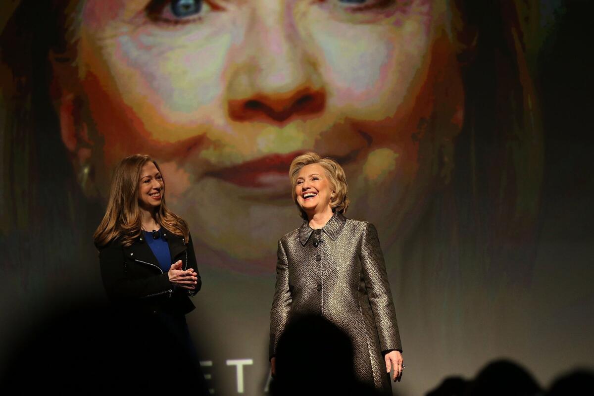 Pressure is mounting on Hillary Rodham Clinton, seen here with her daughter Chelsea in New York on Monday, to answer questions about her use of a private e-mail account while serving as secretary of State.