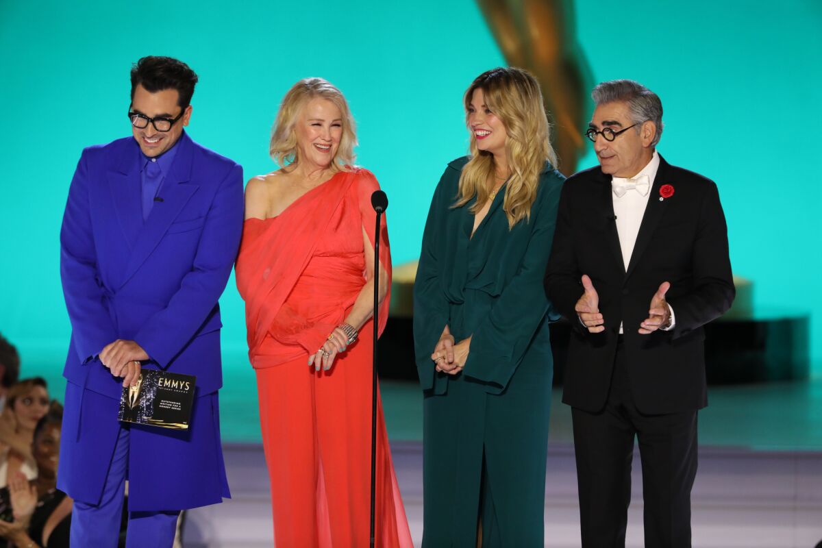 Dan Levy, Catherine O'Hara, Annie Murphy and Eugene Levy onstage at the Emmys.