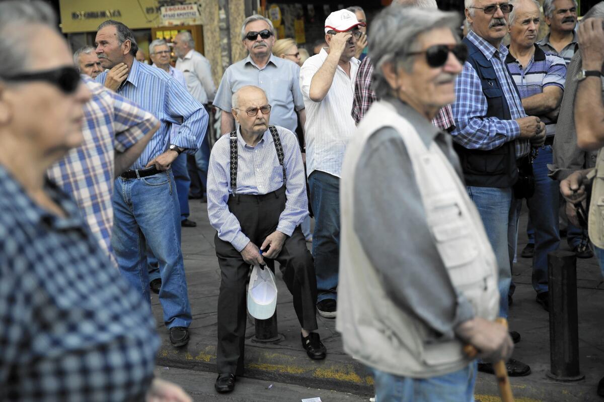 Pensioners take part in an anti-austerity protest in Athens on May 20, 2015.