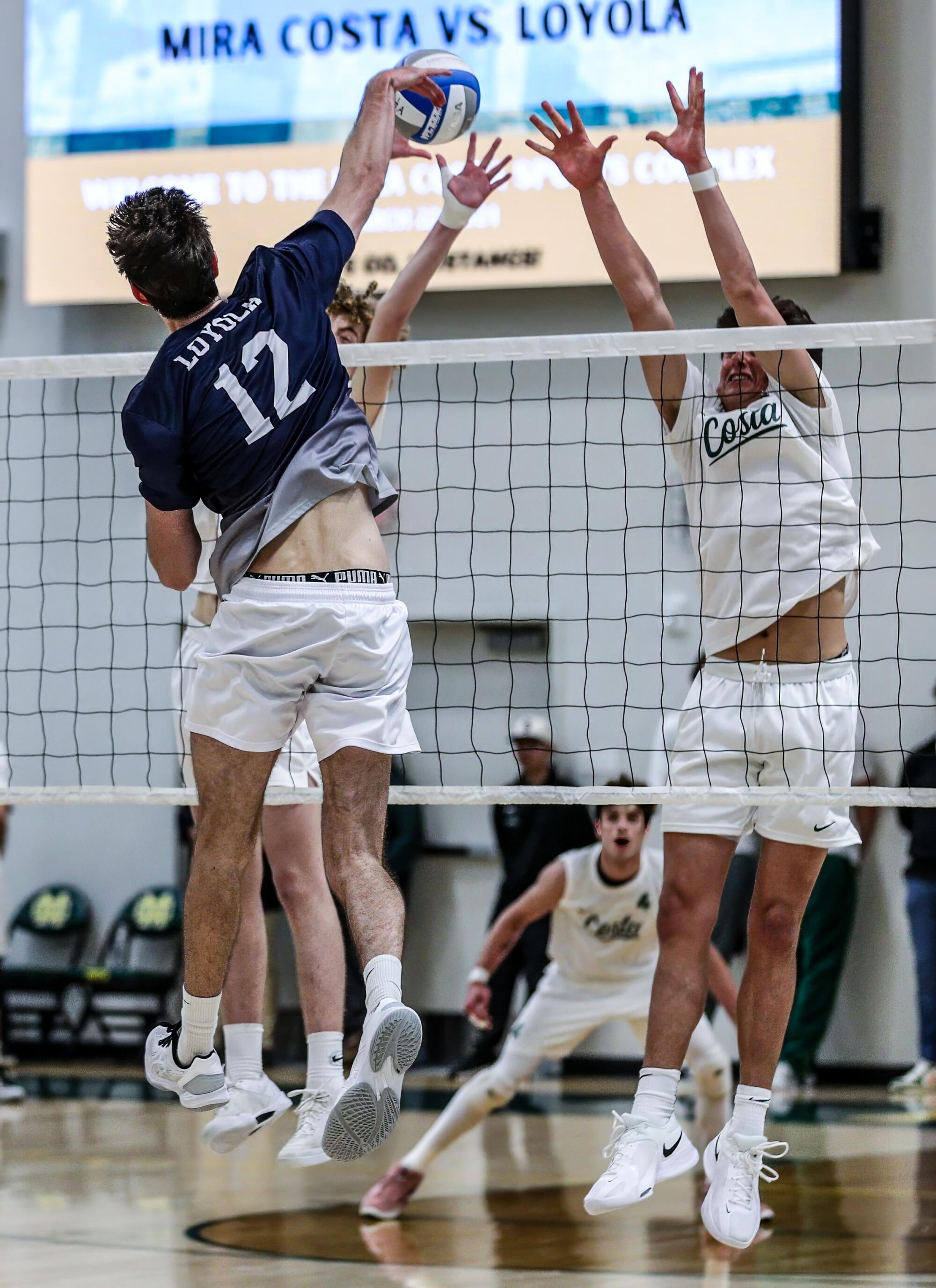 Sean Kelly of Loyola delivers one of his 30 kills in win over Mira Costa.