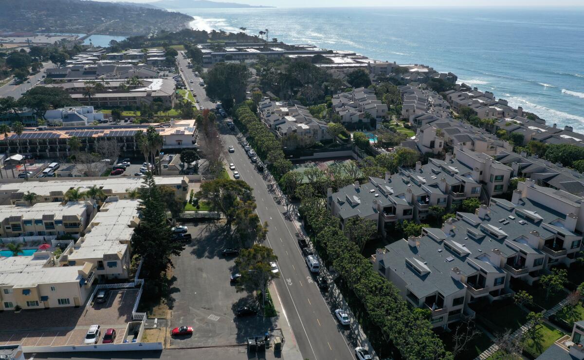 An aerial view of the site of a proposed affordable housing project near million-dollar condos in Solana Beach in San Diego County. It’s a 10-unit project that has been in the works for the last decade and has yet to break ground.