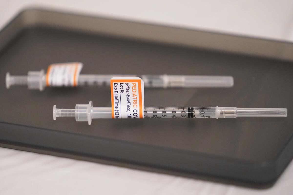 Prepared Pfizer COVID-19 vaccine syringes