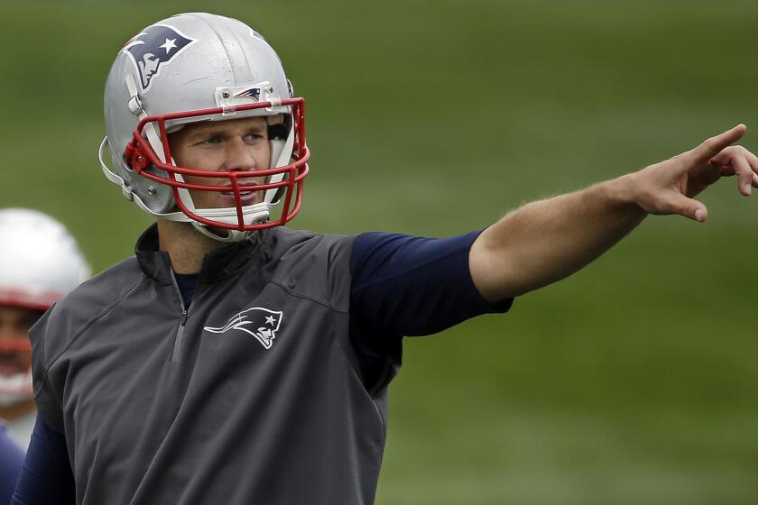 New England Patriots quarterback Tom Brady calls out signals during a team minicamp in Foxborough, Mass., on June 17, 2015.