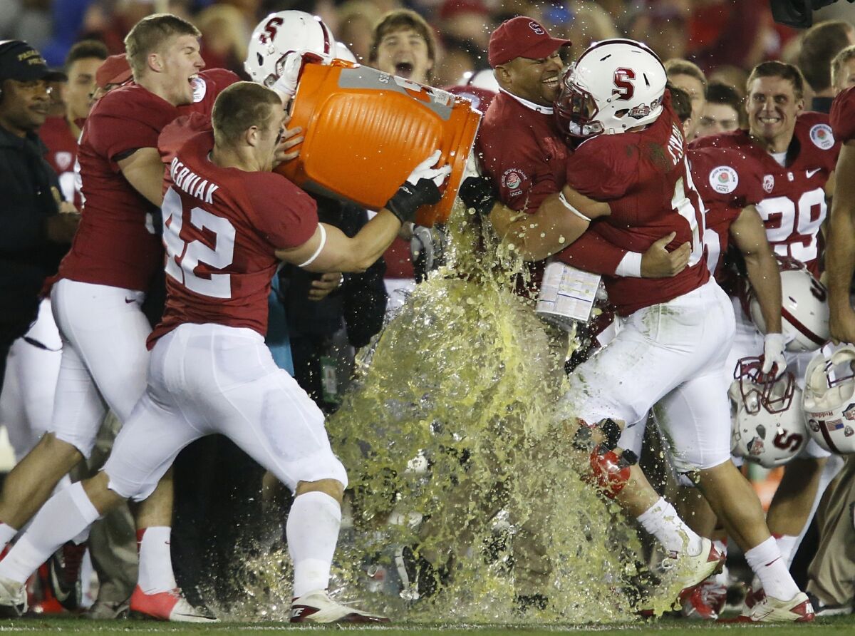 Stanford Coach David Shaw is doused with Gatorade as the clock ticks to zero on a 20-14 win over Wisconsin in the Rose Bowl back in January.