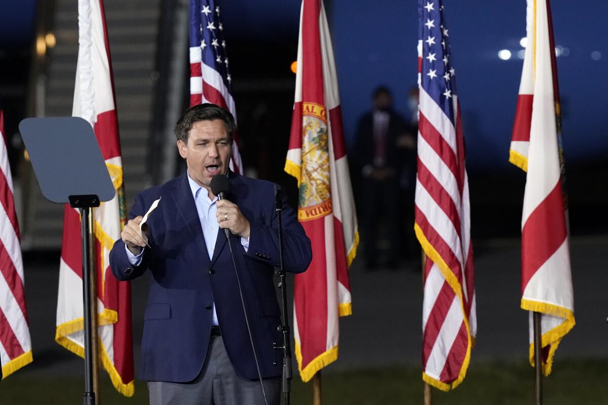 Florida Gov. Ron DeSantis speaks before a Trump campaign rally in Pensacola on Oct. 23.