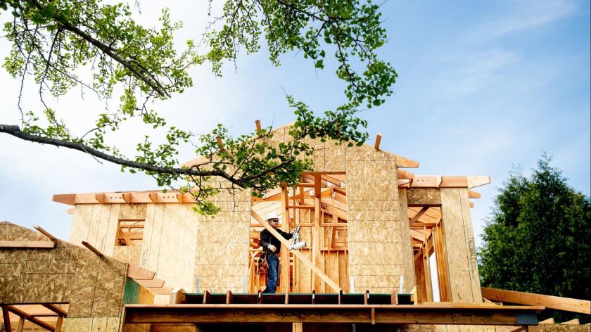 A single-family home under construction in Palo Alto on April 15. Senate Bill 50, which was shelved Thursday, would have cleared the way for higher-density housing in the community.