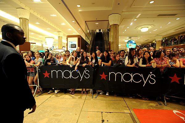 Fans gather at Macy's to see Bieber and the launch of his perfume in Manhattan, NY, on June 23.