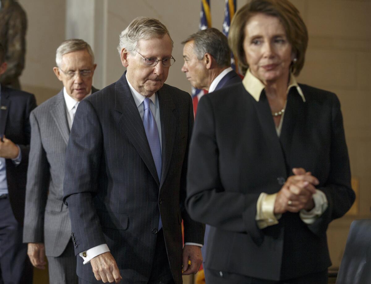 From left, Senate Majority Leader Harry Reid of Nevada, Senate Minority Leader Mitch McConnell of Kentucky, House Speaker John Boehner of Ohio and House Minority Leader Nancy Pelosi of California.