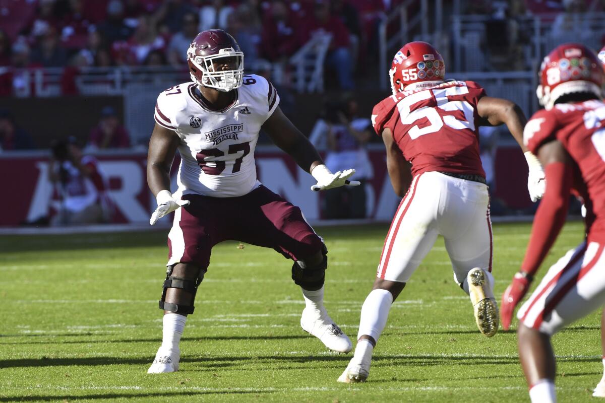 Mississippi State offensive lineman Charles Cross (67) sets up to pass block against Arkansas in November.