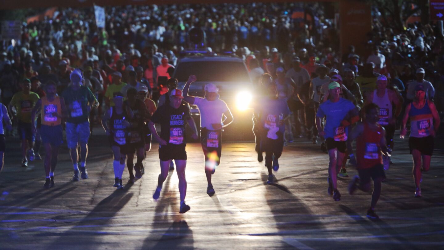 Legacy Runners start the 30th Los Angeles Marathon at Dodger Stadium on Sunday morning.